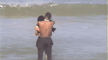 Travis Scott Hug Kylie Jenner GIF