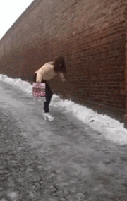 Woman slipping on ice in heels