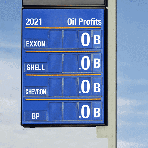 Video gif. Numbers on a blue flip sign increase until they land on the 2021 profits for big oil companies with Exxon at 23 billion, Shell at 19.3 billion, Chevron at 15.6 billion, and BP at 12.8 billion.