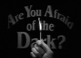 Sign that says Are You Afraid of the Dark
