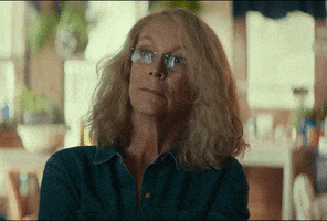 Movie gif. Jamie Lee Curtis as Laurie in Halloween (2018) sits at a table across from someone. She nods her head with an impressed look on her face as she says, “well, you should.”