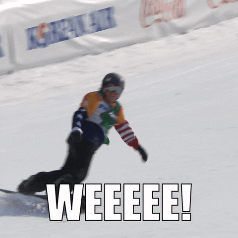 Sports gif. Paralympic snowboarder makes an S shape in the snow as they move down the snowy hill. They wave their arm up. Text, “Weeeee!”