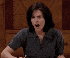 Friends gif. Courteney Cox as Monica Geller holds a pencil in her hand as she turns her head, jaw dropped, eyes wide in shock.