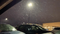 Snow Falls on Cars at Sioux Falls, South Dakota, Amid Weather Warnings