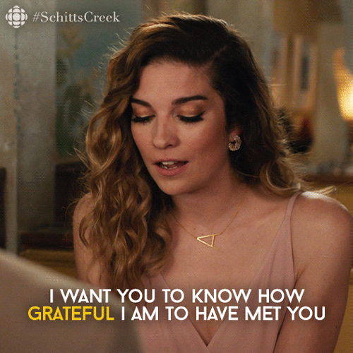 Schitt's Creek gif. Annie Murphy as Alexis. She's in the cafe and she's speaking to someone very intently and intimately. She looks down, shy, before looking deeply into their eyes and says, "I just want you to know how grateful I am to have met you." 