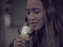 Movie gif. Beyonce in Homecoming closes her eyes and into a golden mic says, “thank you for bringing everyone here into my life.”