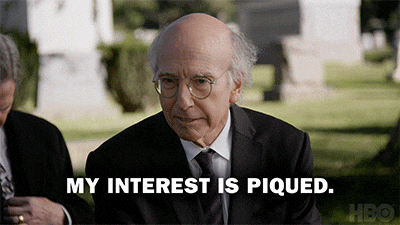 Larry David saying, "My interest is piqued."