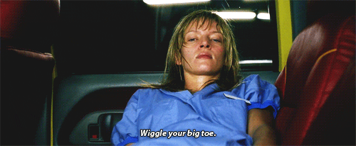 scene from movie Kill Bill with subtitle Wiggle Your Big Toe