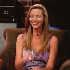 Friends gif. Lisa Kudrow as Phoebe Buffay in Friends laughs, which turns into a dramatic cough, and reaches for a tissue.