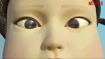 TV gif. Close-up of the eyes of The Doll as her eyeballs twitch in all directions. 