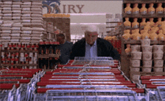 Leslie Nielsen Shopping GIF