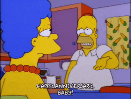 The Simpsons gif. Homer raising his arms and telling Marge, "Happy anniversary, baby!"
