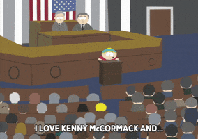 South Park gif. Eric Cartman stands at a podium in front of a crowd of U.S. Congressmen and addresses them nervously, saying, "I love Kenny McCormack and... I want you to love him too," which appears as text.