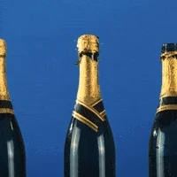 Champagne bottle corks popping out