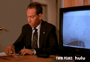 miguel ferrer fake smile GIF by HULU