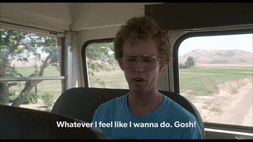 Movie gif. Riding at the back of the school bus on a long rural road, Jon Heder as Napoleon Dynamite is bothered by the question of what he's going to do today. Text: "Whatever I feel like I wanna do. Gosh!"