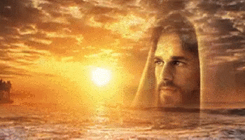 Video gif. A sunset behind an ocean is casting a golden hue over the land and Jesus is overlaid on top of it.