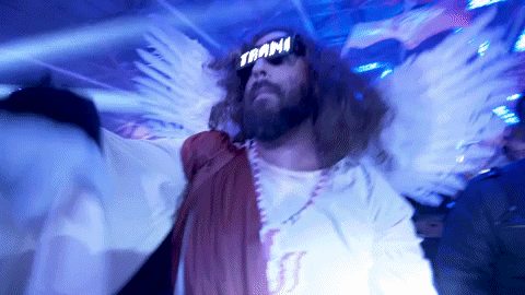 Jesus wearing glasses that say trance, while dancing