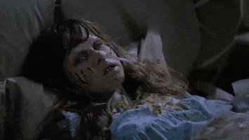 throwing up the exorcist GIF