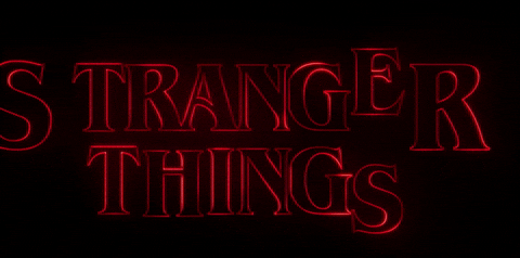 Stranger Things tv show intro gif, moving text - letters arranging to spell "Stranger Things"