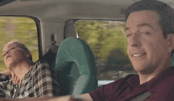 waving ed helms GIF