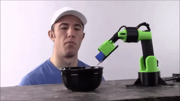 slantconcepts food robot robot cereal robot food robot spoon GIF