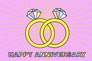 Illustrated gif. Light radiates from 2 interlocking diamond rings with facets that flash in pink, white, yellow, and blue pastels. Text, "Happy Anniversary."