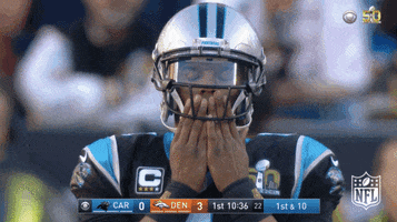 Sports gif. Cam Newton of the Carolina Panthers stands on the field and closes his eyes, kissing his palms before folding his hands together. He looks like he's praying, hopeful for a win.