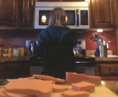 sneaking food lol GIF by America's Funniest Home Videos