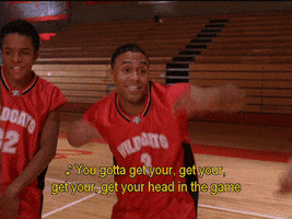 Movie gif. Carleton Bluford as a basketball dancer in High School Musical, tapping his chest with his hands spread wide. Text from the song, "You gotta get your, get your, get your get your head in the game."