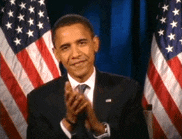 Political gif. Barack Obama looks at us with a proud smile and claps. 