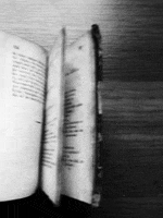 black and white book GIF