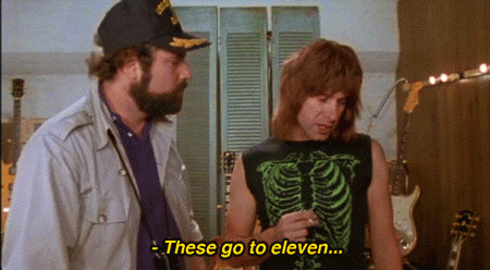 GIF of two men talking about how "these go to eleven."