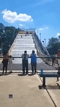 Giant Slide GIF by Storyful