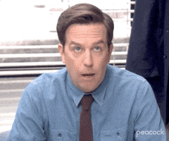 The Office gif. Ed Helms as Andy rolls his eyes and looks to the side as he sarcastically says, "Okay."