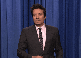 The Tonight Show gif. Fallon looks perplexed and glances upwards, letting his mouth hang agape for a second. He raises a hand to gesture and says, "This is weird..." 