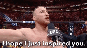 Sports gif. Sweaty, shirtless, Justin Gaethje speaks into a UFC interviews microphone saying, "I hope I just inspired you."