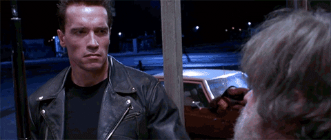 scared arnold schwarzenegger GIF