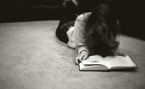 black and white book GIF
