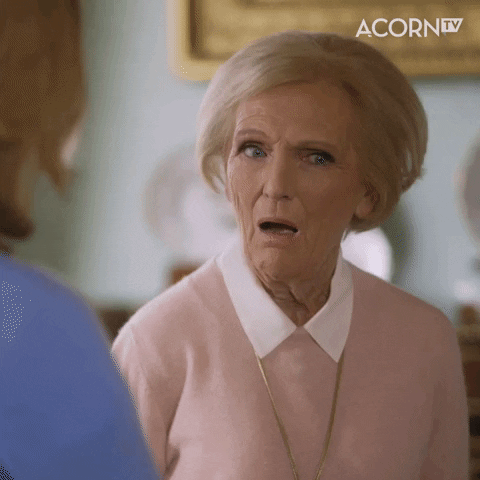TV gif. Wearing a light pink sweater and a long necklace, celebrity chef Mary Berry looks away from us in slack-jawed surprise, then looks back as if to say "really?"