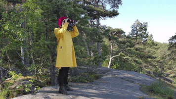 IsletGroup binoculars rain coat red beanie islet group GIF