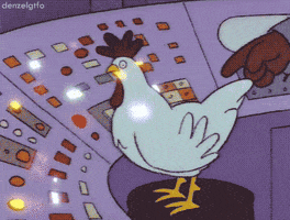 The Simpsons gif. Chicken perches on a stool in front of a control panel full of flashing button, bobbing its head around to peck at the buttons.