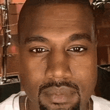 Staring Kanye West GIF