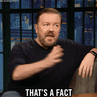 Late Night gif. Ricky Gervais looking intently at Seth and declaring,
