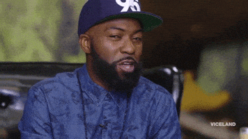 Wink Flirt GIF by Desus & Mero