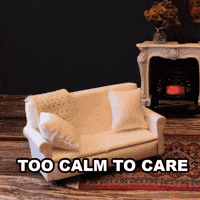 Sponsored gif. A hand places a lounging gingerbread man wearing a Canada Dry sweater onto a miniature couch. Text: "TOO CALM TO CARE"