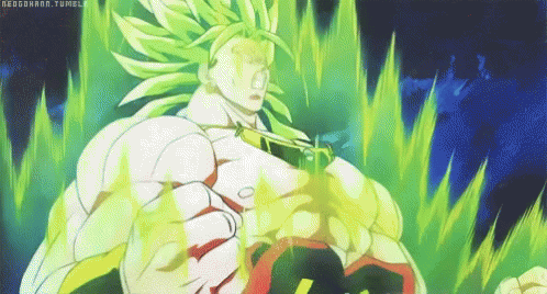 Anime gif. Broly from Dragon Ball Super. Broly is lit up with power, clenching his fists as he goes super saiyan. 