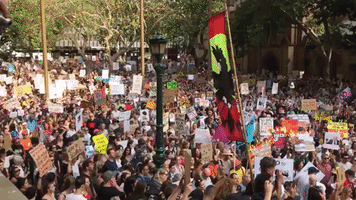'ScoMo Has Got to Go': Climate Protesters Chant Outside Sydney Town Hall