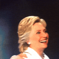 Political gif. Hillary Clinton startles and looks up in amazement as a cartoon ghost swoops above her head, then glides away.