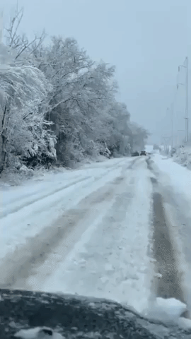 Car in Ditch as Winter Storm Brings Slick Road Conditions to Oklahoma